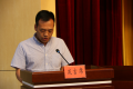 胡升文主委代表民建盘龙区第一届委员会作工作报告