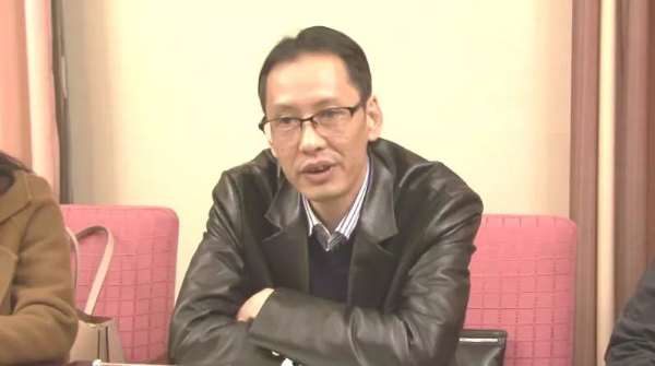 云南省少数民族古籍整理出版规划办公室副主任起国庆做重要讲话
